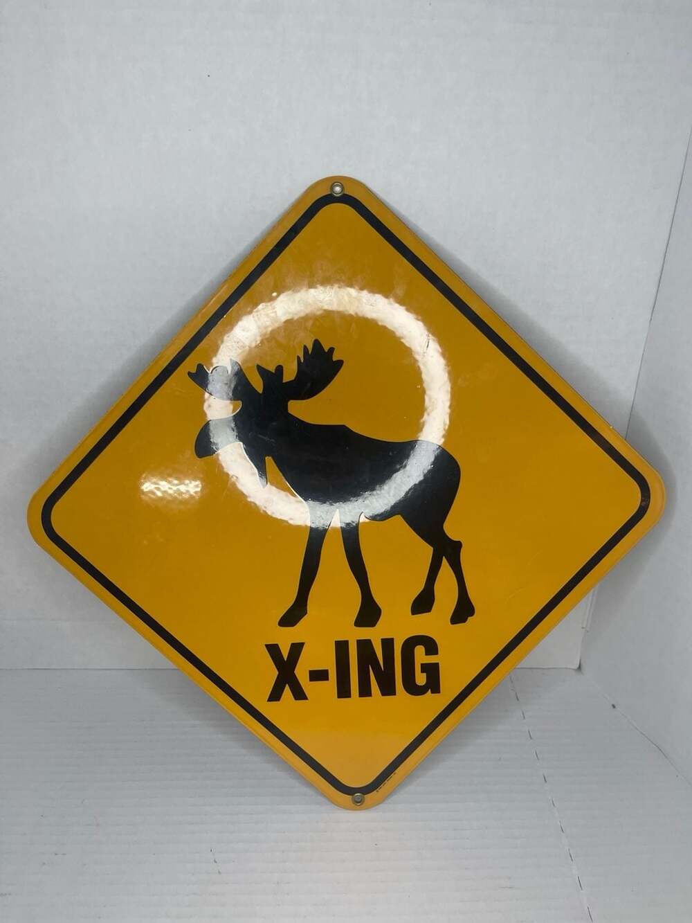 Ande Rooney 1999 Moose Crossing X-ING Porcelain Enamel Sign